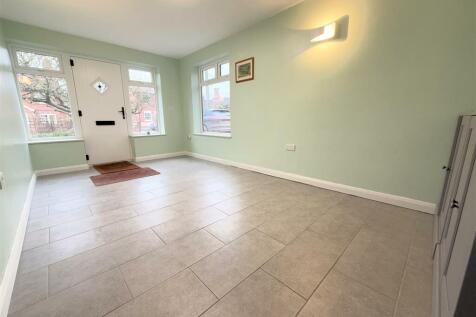 INITIAL ENCLOSED ENTRANCE HALL