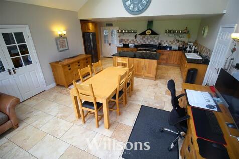 family-dining area into kitchen.jpg