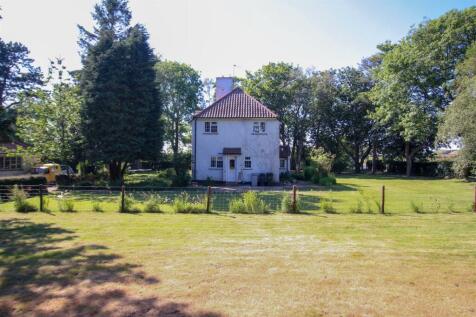 photo shows adj house a.jpg