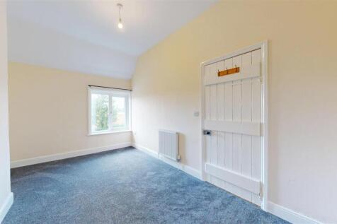 Broad Oak Cottage 6 Bedroom One.jpg