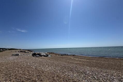 THE BEACH AND SURROUNDING AREA