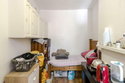 Living quarters second and third floor.
