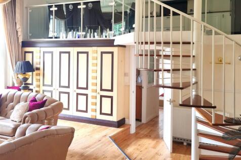 Living Space with spiral staircase.jpg