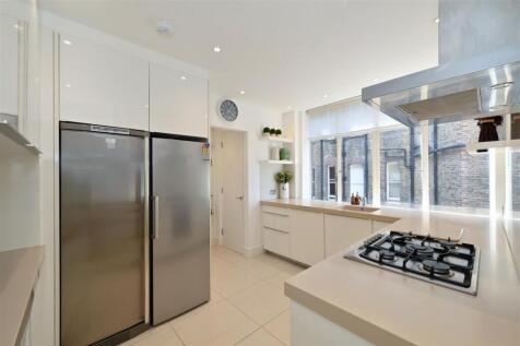 property in Oakwood Court, 
Holland Park, W14