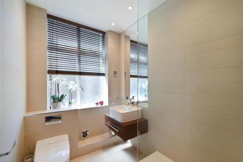 property in Oakwood Court, 
Holland Park, W14