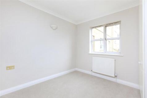 property in Milton Court, 
Chesterton Close, SW18
