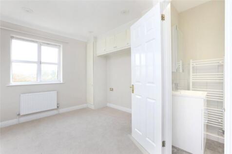 property in Milton Court, 
Chesterton Close, SW18
