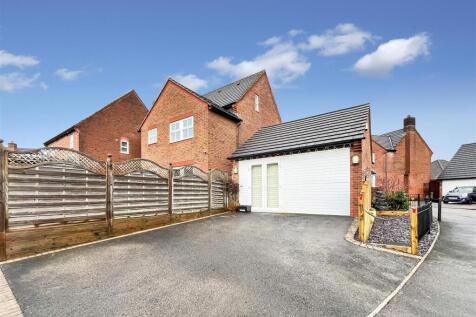 Double Garage And Driveway Parking