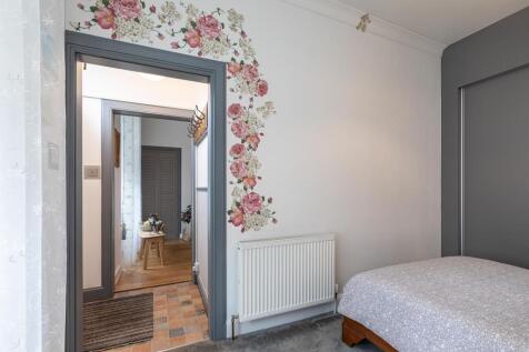 Bedroom view into hallway