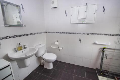 7 hinton road downstairs shoer room.JPG