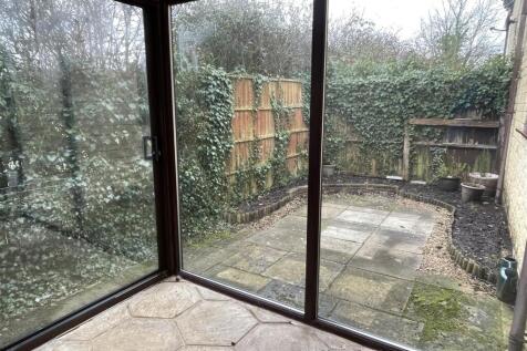 Conservatory and courtyard garden.JPG