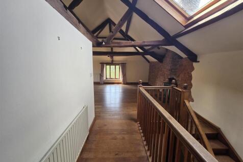 STAIRS RISING TO SECOND FLOOR