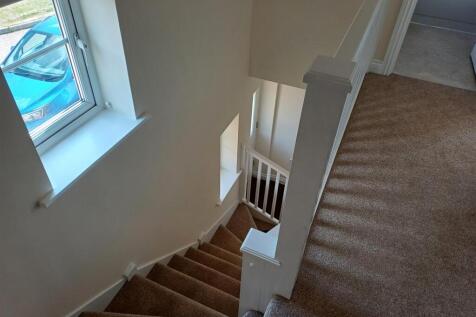 STAIRS AND FIRST FLOOR LANDING