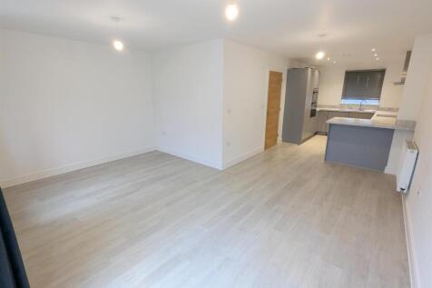 OPEN PLAN LIVING/DINING/KITCHEN AREA
