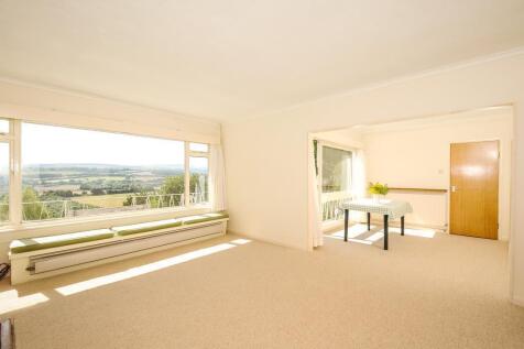 Spacious living room with large windows