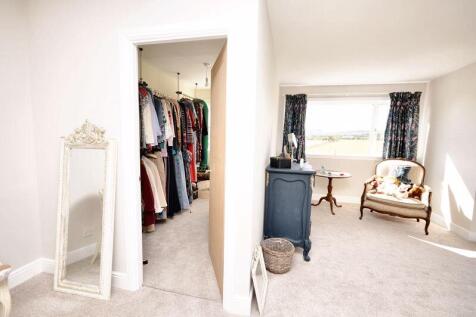Upstairs master bedroom with dressing...