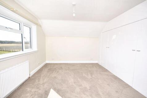 Bedroom two with fitted wardrobes