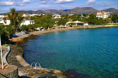 Nearby sandy town beach Amoudi