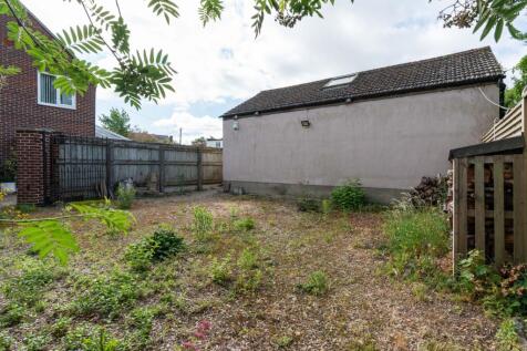 Outbuilding and parking