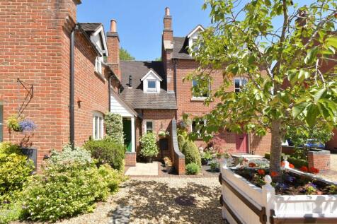 Millburn in its courtyard setting