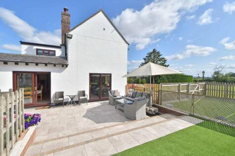 Paved terrace to the side