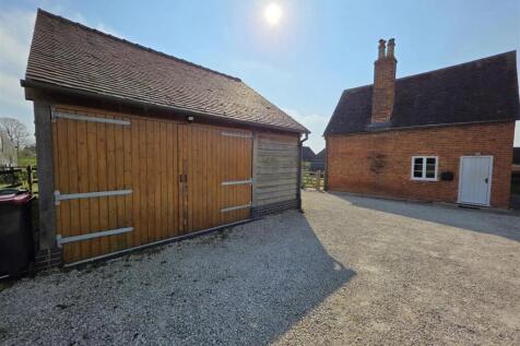 DOUBLE GARAGE AND DRIVE
