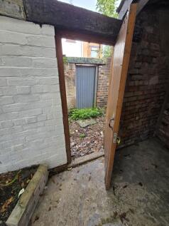Alleyway by garden