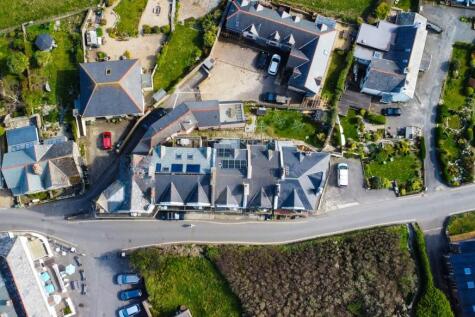 Aerial showing rear communal garden