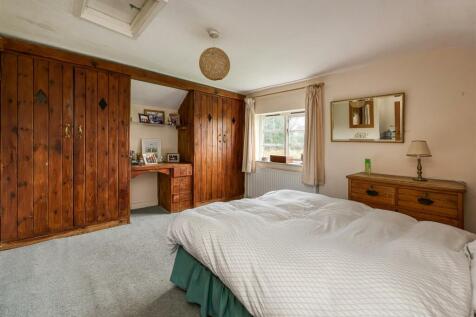 Greystoke Cottage-bed2.jpg