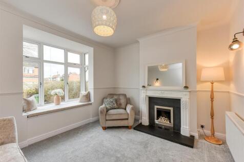 100 Jeffcock Road-Living Room.jpg