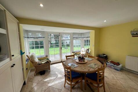 Dining area and doors to garden