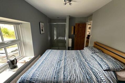 Bedroom with shower