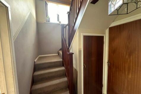 Hall with turning staircase