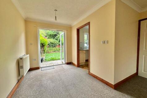 Open plan living /dining with doors t...