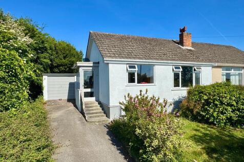 Front with driveway parking, front ga...