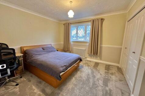 Bedroom with built in wardrobes