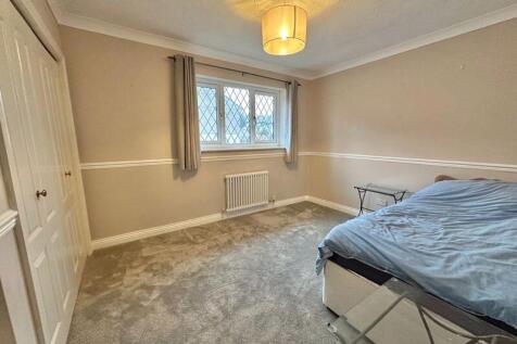 Bedroom with built in wardrobes