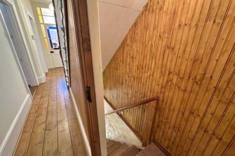 Hall and stairs down to cellar