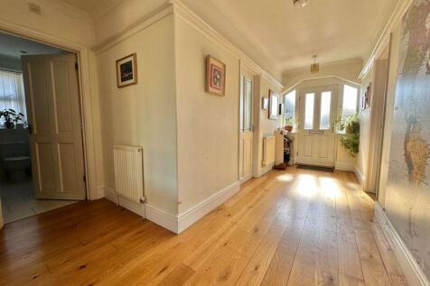 Spacious hallway with attractive floo...