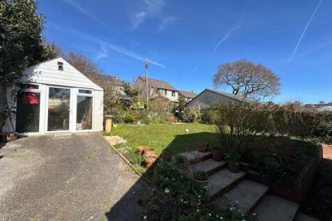 Rear garden with studio/store