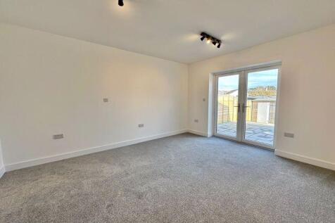 Bedroom with doors to garden
