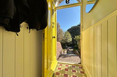 Vestibule with panelling and tiled floor