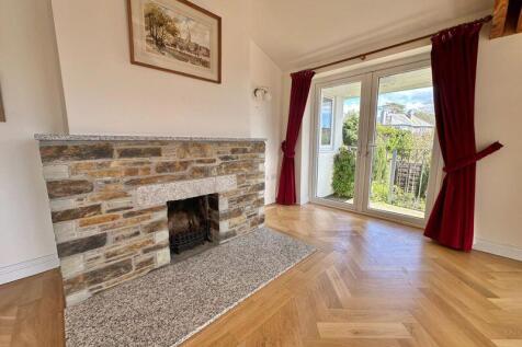 Fireplace and doors to balcony