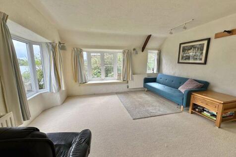 First floor living room with creek views