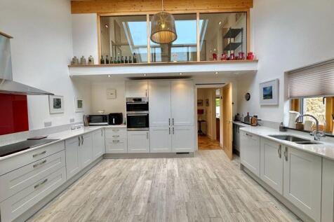 Kitchen with double height ceiling