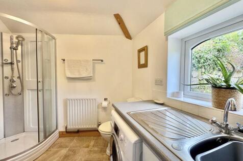 Utility Room With Shower &amp; WC
