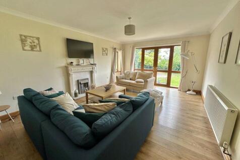 Living room with doors to garden