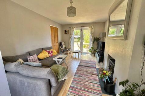 Living room with doors to garden