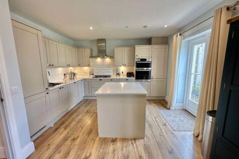 Kitchen with doors to garden