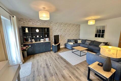 Living room with doors to garden